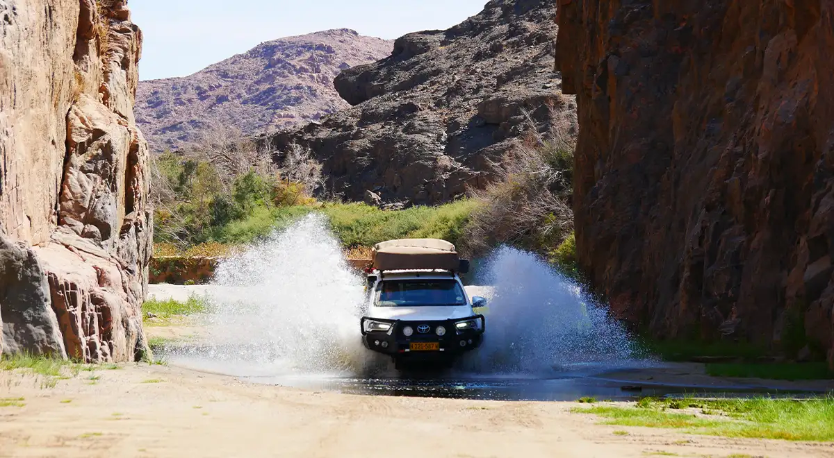 4×4 Car Drives Through Water in Namibia 4x4 Car Drives Through Water in Namibia