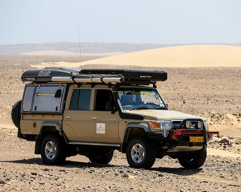 4×4 Car drives in the sand and dunes of the Namib Desert 4x4 Car drives in the sand and dunes of the Namib Desert